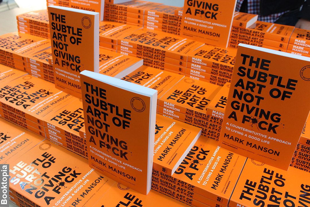 Display of The Subtle Art of Not Giving a Fck Book. The book that can help with coping with challenges,
