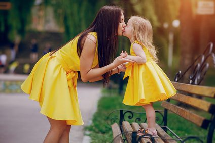 Parent-Child Kiss, mother kissing daughter on lips