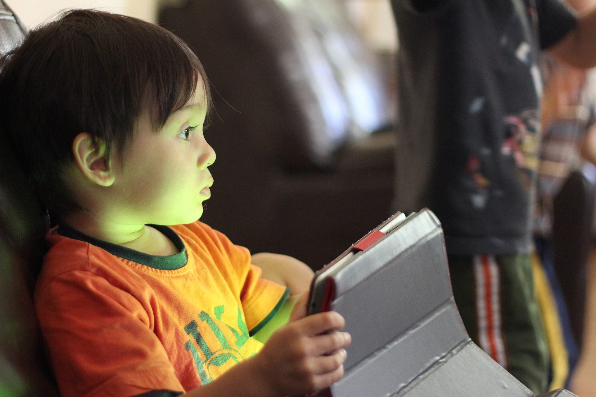 Connected boy with Tablet on Lap
