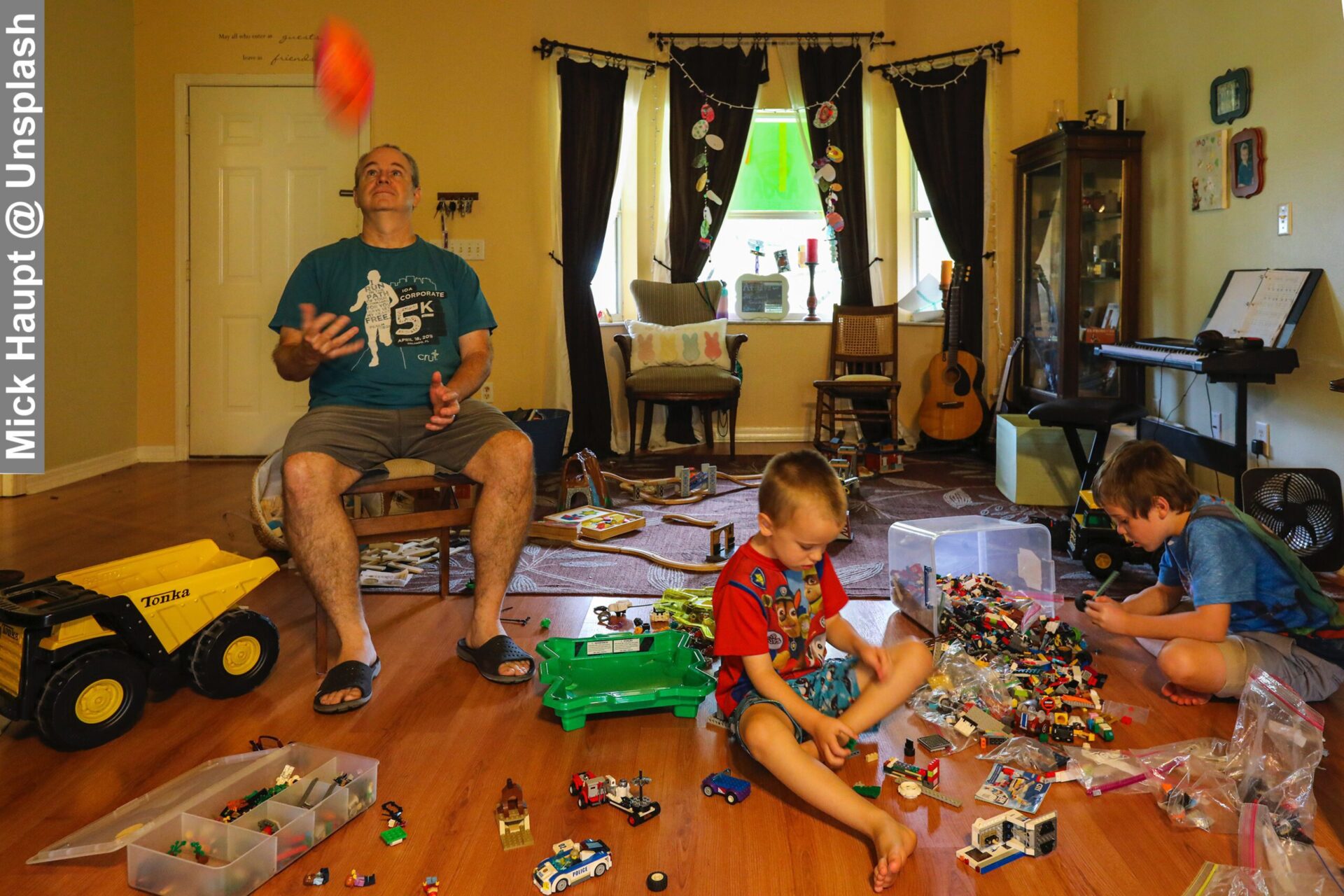 Dad Having Messy Extreme Lego Time With Kids
