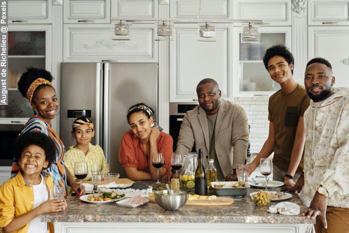 Large Happy Family Life in Kitchen With Food