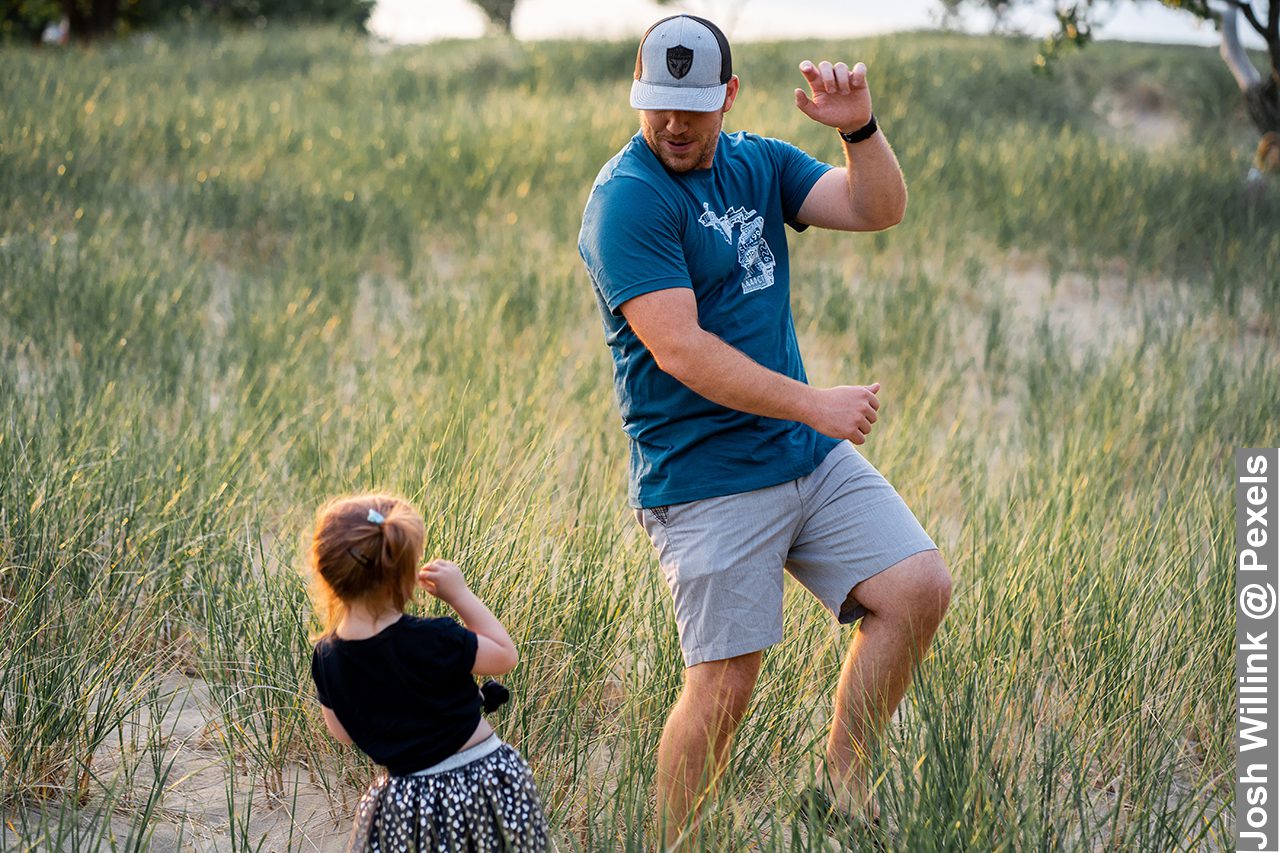 Weekend entertainment of father and daughter having a chill day outdoors