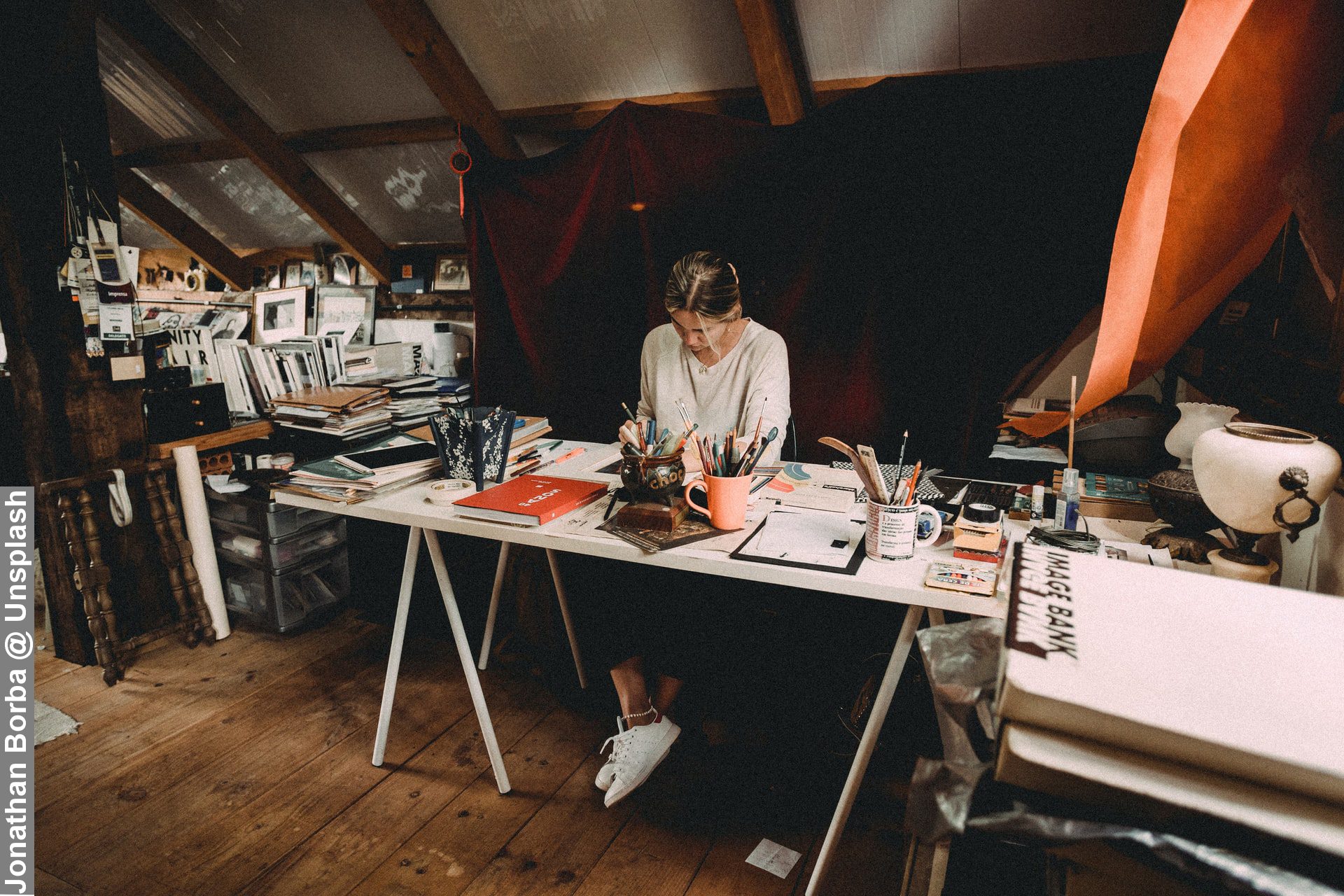 Lady with her unique working routines in her artist studio