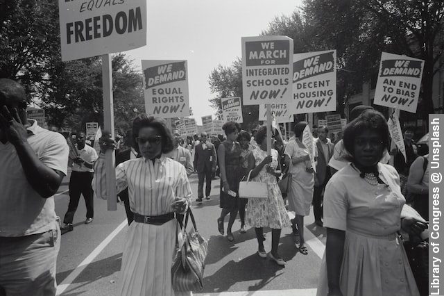 Civil rights march on Washington, D.C, We want Freedom and School for our kids placards