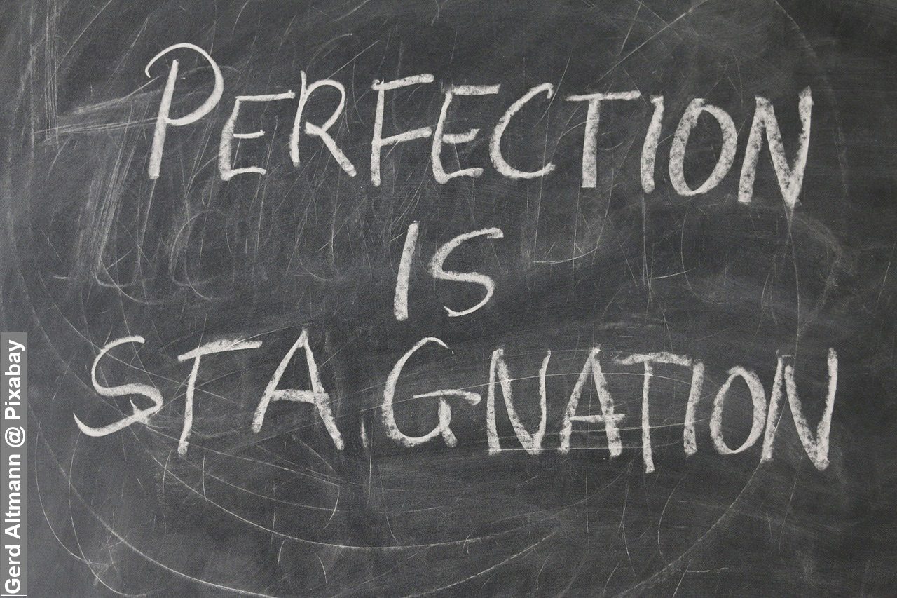 Perfection is stagnation written on black boar