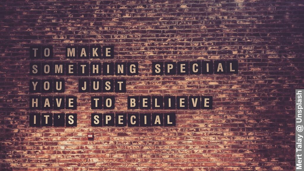 Make things special write in boards, stuck onto wall of brown bricks