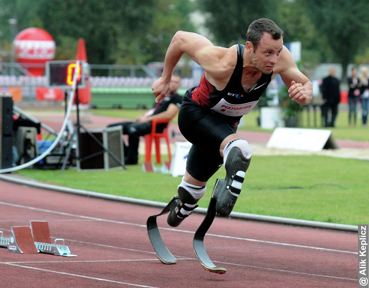 Oscar Pistorius driving out of block at a track meet over 400m on his blades